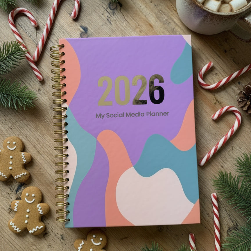 2026 planner with colorful design on a wooden surface